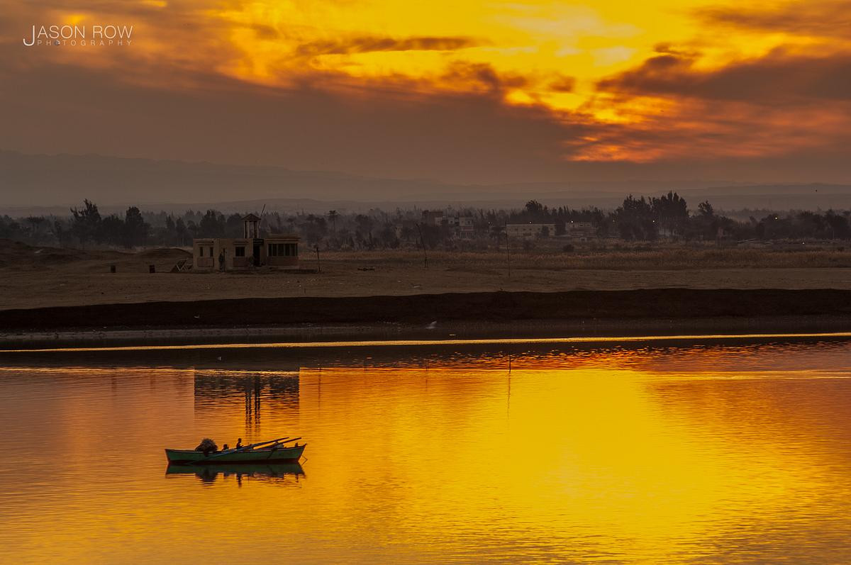 Fisherman on the Suex Canal at sunset. By Jason Row Photography