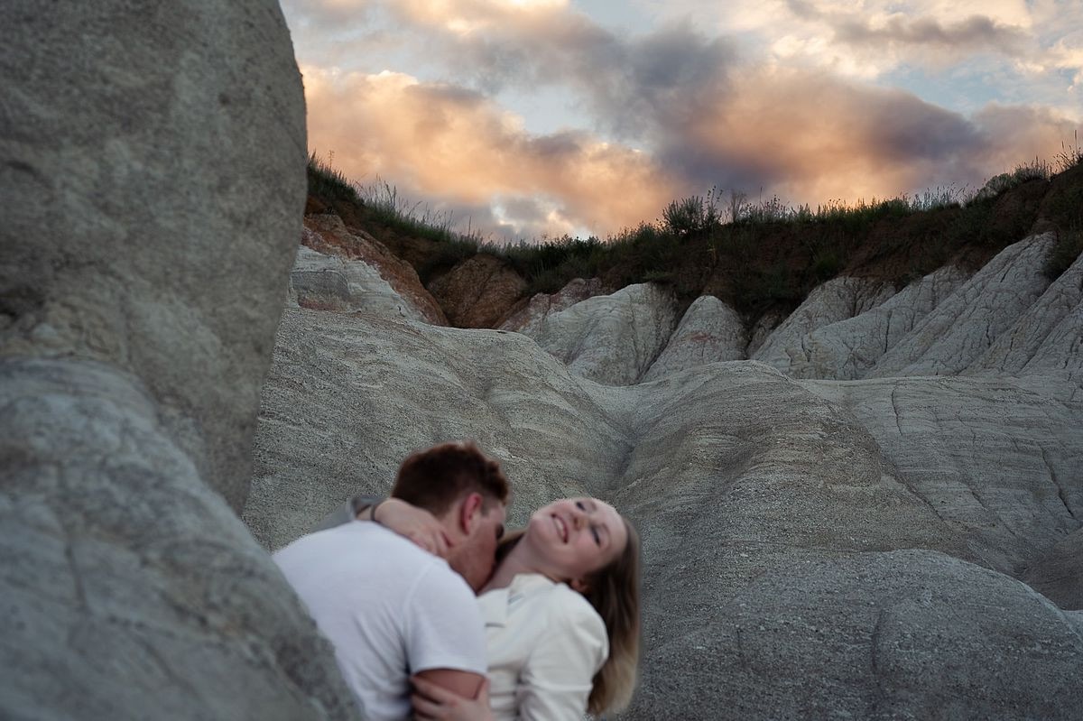 empowering photograph of a beautiful couple during outdoor couples boudoir session