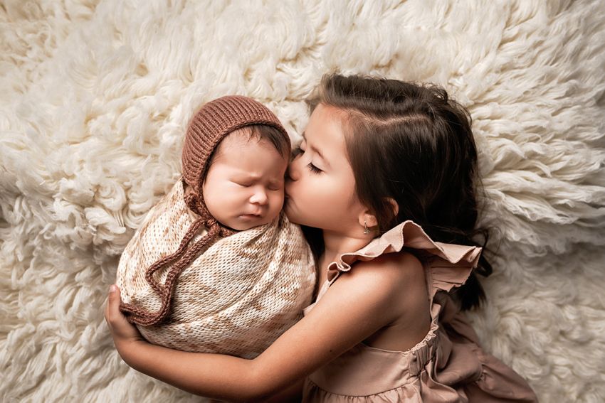 Different Types of Posed Newborns Swaddled Vs. Not