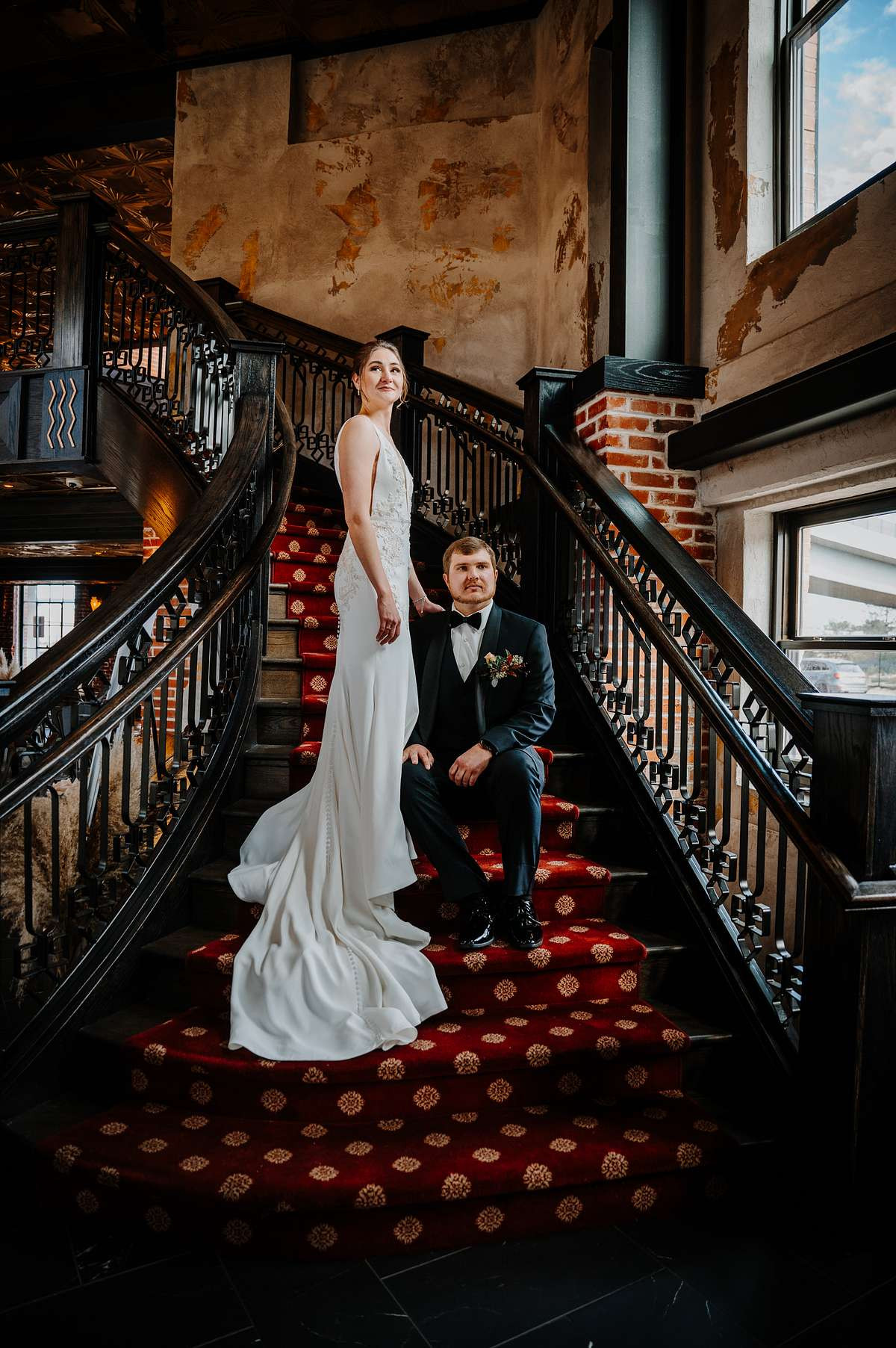 Ironworks couple on staircase