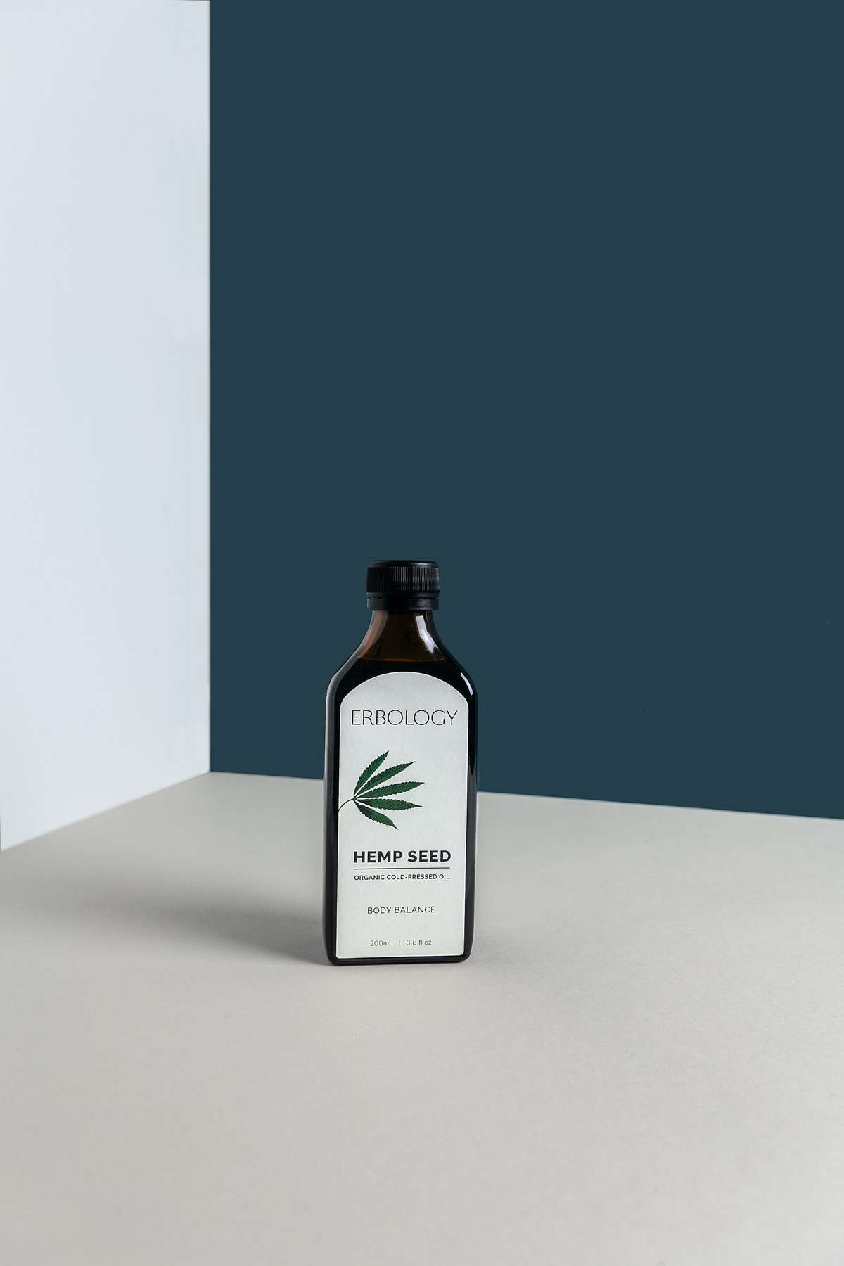 hemp seed oil bottle in a corner