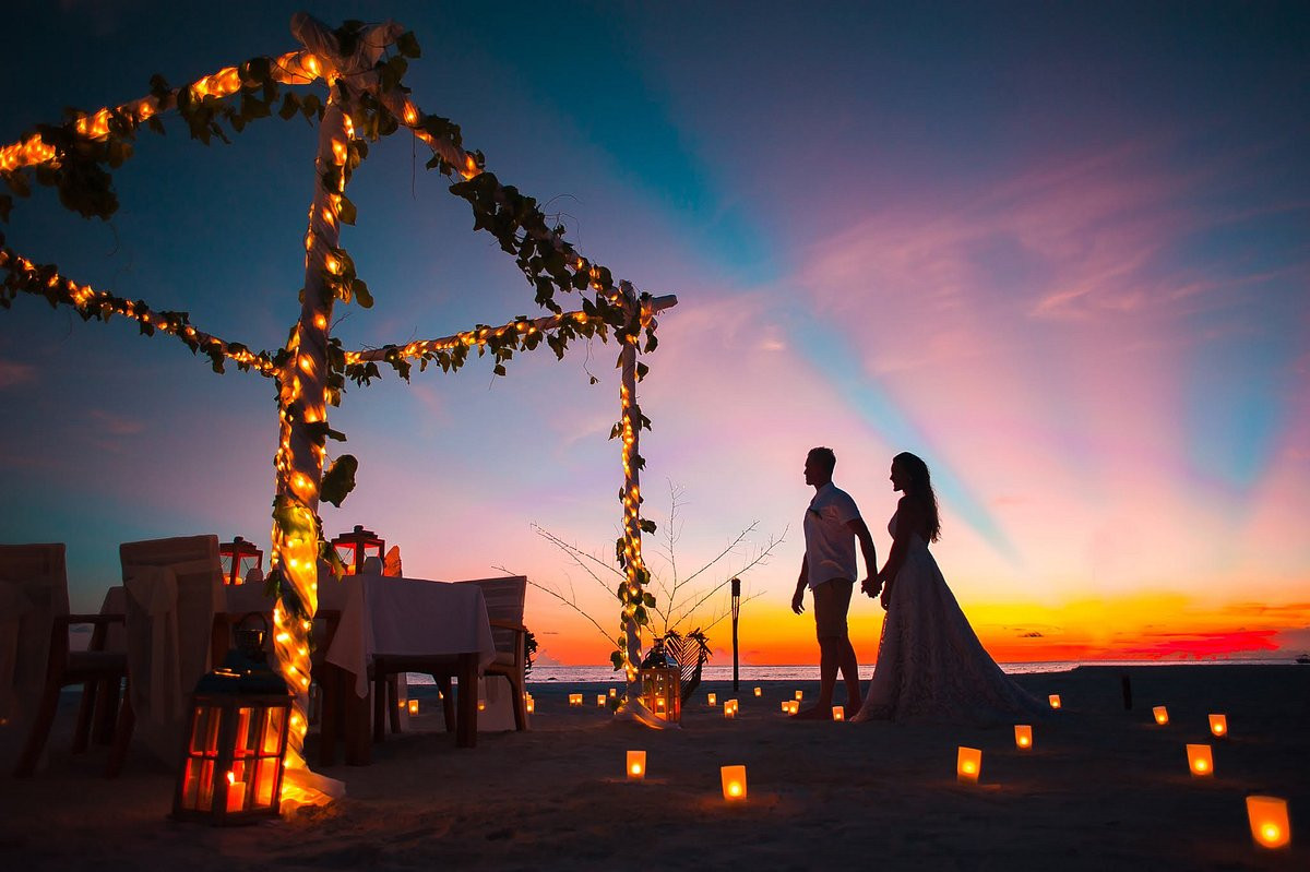 Kim and Neil's 10 Annivesary celebrations under the glowing sunset in the Maldives Island.