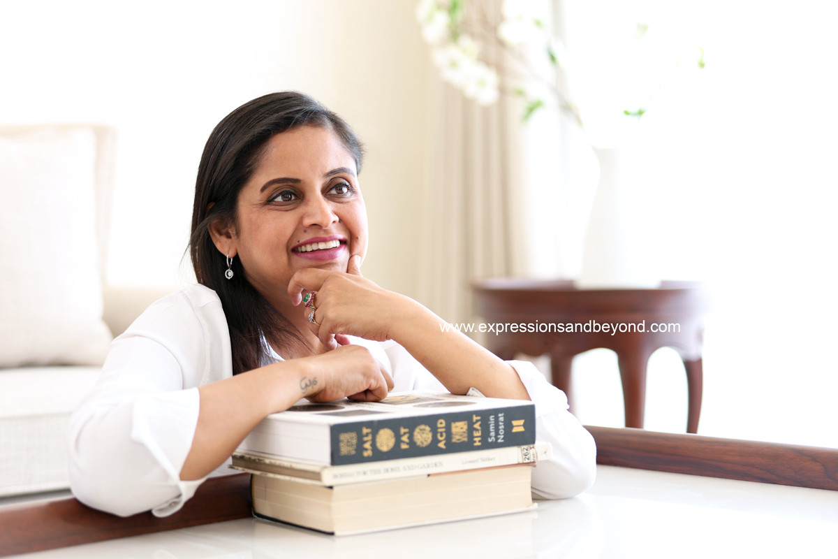 Lifestyle portrait of a nutritionist & wellness professional at her home